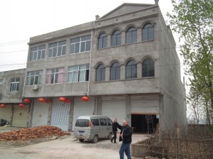 The new “Guoyang love house”-it’s just the right-hand side part – that’s Ken outside.